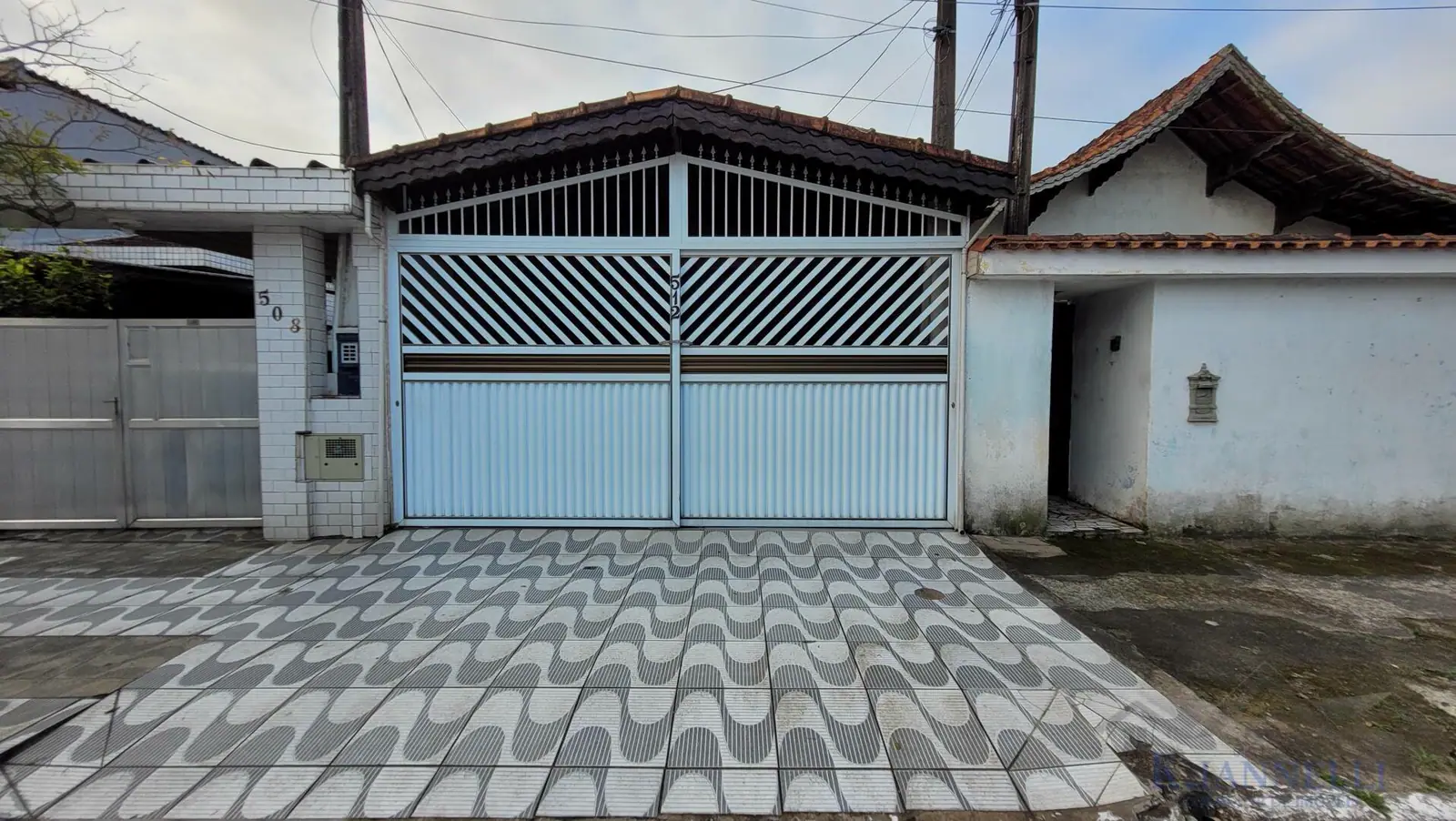 Casa com 3 Dormitórios no Centro de Praia Grande - Boqueirão