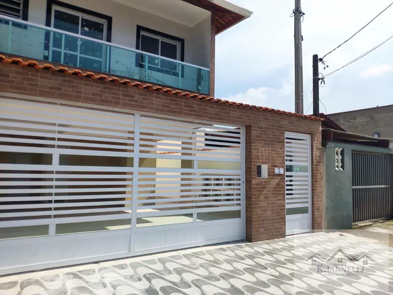 Casa 02 Dormitórios Térrea com quintal Tude Bastos - R$ 360.000
