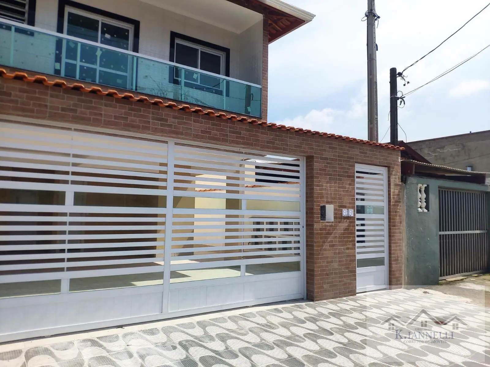 Casa 02 Dormitórios Térrea com quintal Tude Bastos - R$ 340.000